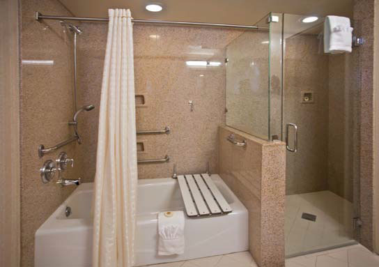 This bathroom includes a transfer tub-shower with a seperate walk in shower, all trimmed in granite.